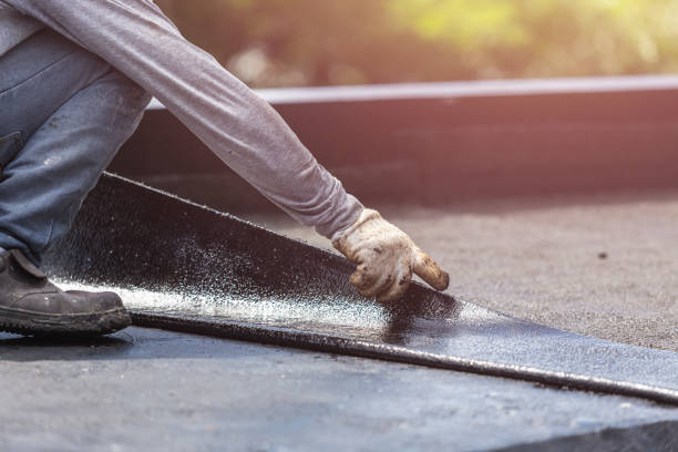 Professional Waterproofing technician working in Marshall, MI